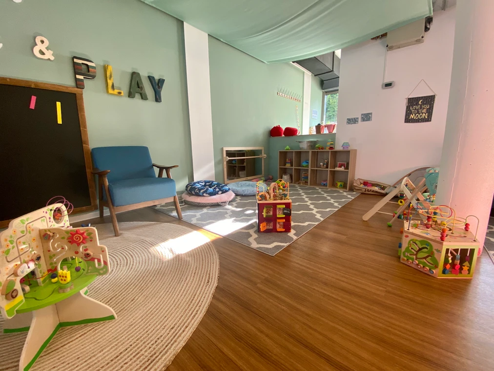 Sensory play area for babies and toddlers with mats and developmental toys


