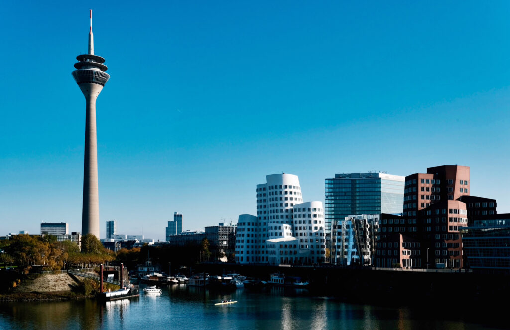 Rheinturm and MedienHafen skyline in Düsseldorf with modern architecture and waterfront view – best Düsseldorf neighborhoods for families and kids