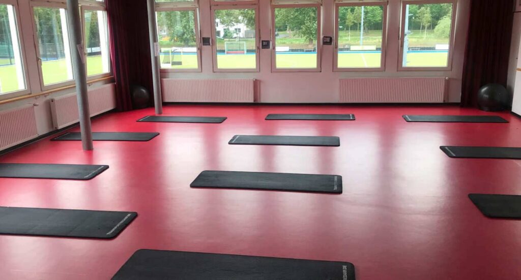 space with mats to practice yoga and other activities