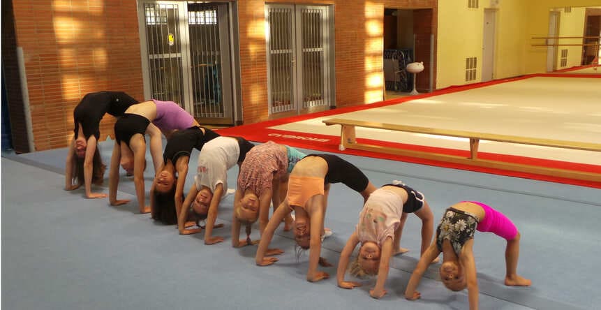 kids practicing performance gymnastics