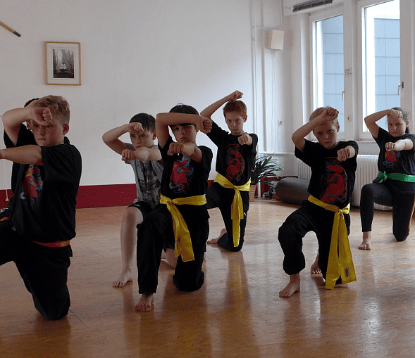 Children practicingmartial arts at Akademie für Kampfkunst – KuTaeKa-Do, Kickboxing & Kung Fu 
