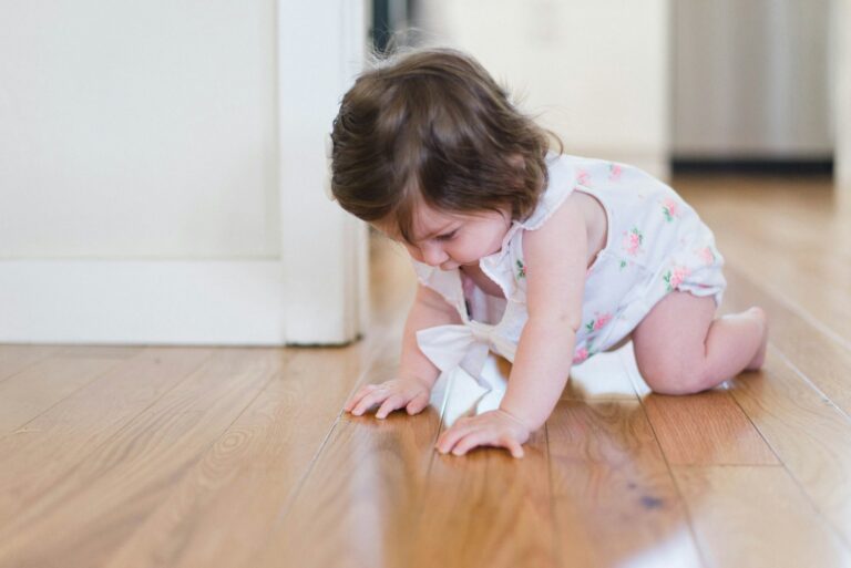 Baby learning to move forward on hands and knees — how to help baby crawl naturally at home